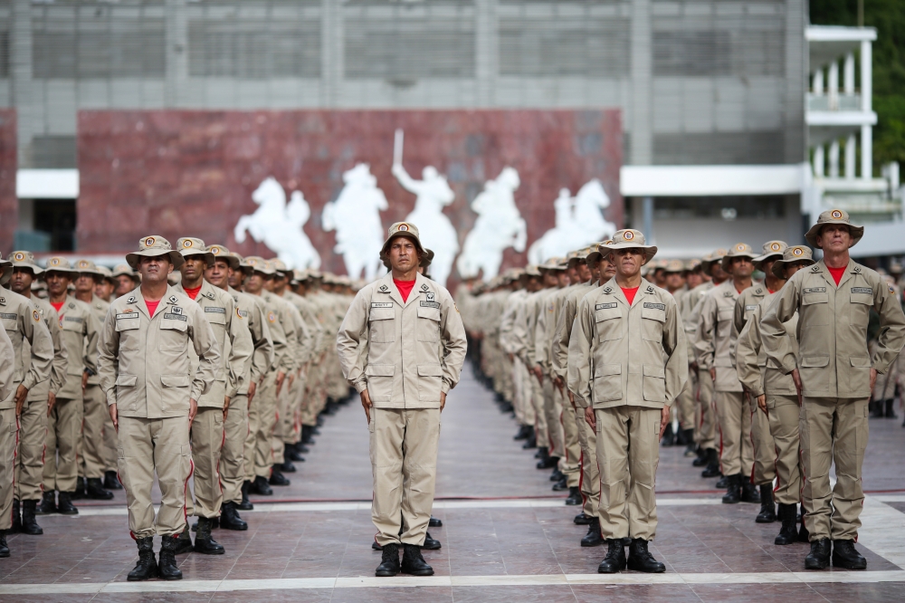 Militia members take part in a ceremony in Caracas, Venezuela on Saturday. -Reuters photo
