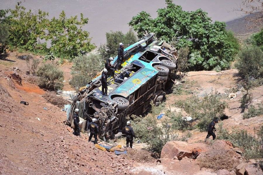 Rescue workers attend to the scene after a bus falls into a ravine in Arequipa, Peru, in this Feb. 21, 2018 file photo. — Reuters