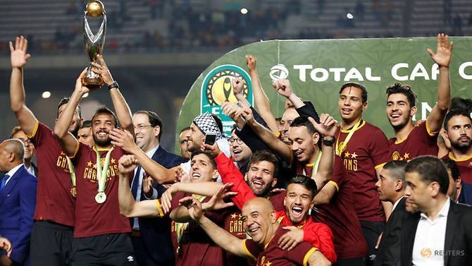 Esperance's Moez ben Cherifia celebrates with the trophy after winning the CAF Champions League aagainst Wydad Casablanca at Olympique de Rades Stadium, Rades, Tunisia, in this June 1, 2019 file photo. — Reuters