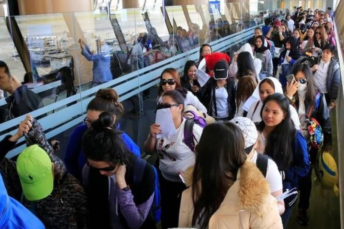 Travelers are seen at the Ninoy Aquino International Airport in Manila, Philippines, in this file photo. — Reuters