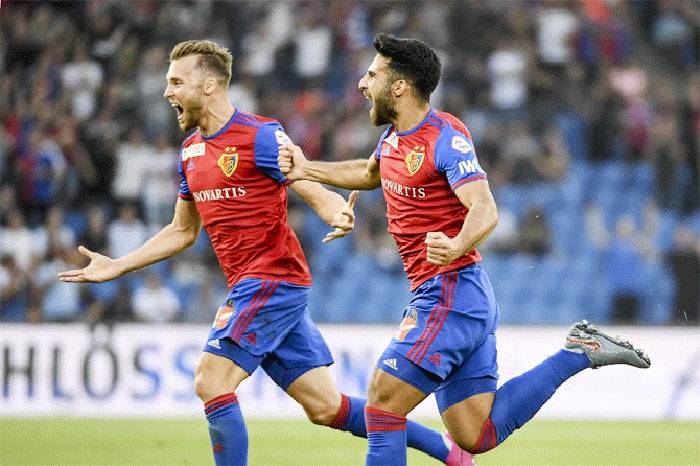 Basel players celebrate after scoring in their 2-1 win against PSV Eindhovin in the Champions League qualifier on Tuesday. — Courtesy photo