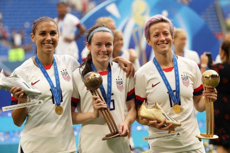 Alex Morgan, Rose Lavelle and Megan Rapinoe of the US celebrate winning the Women's World Cup. — Reuters