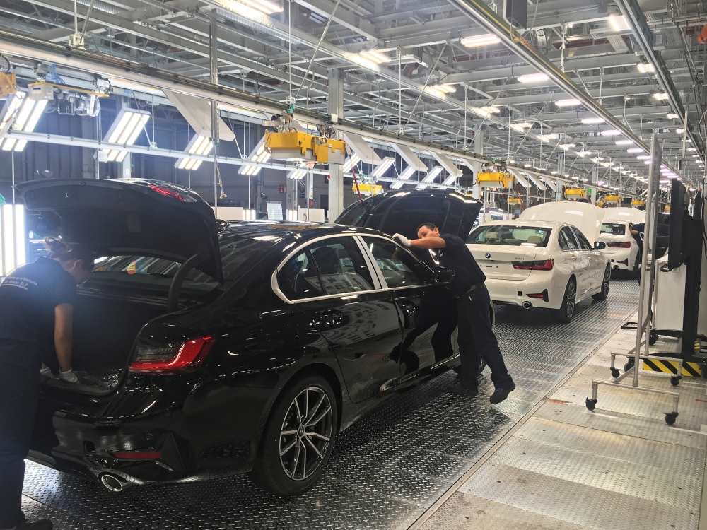 Employees work on a BMW 3 Series car during a media tour at the new plant of German automaker BMW in San Luis Potosi, Mexico, in this June 6, 2019 file photo. — Reuters