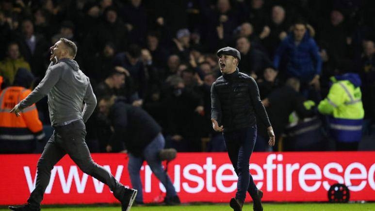 Fans invade the pitch during the FA Cup fourth round match between Millwall and Evertonat at the Den, London, Britain in this Jan. 26, 2019 file photo. — Reuters