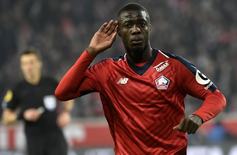 In this file photo taken on Dec. 01, 2018, Lille's Ivorian forward Nicolas Pepe celebrates after scoring a goal during the French L1 football match between Lille (LOSC) and Olympique Lyonnais (OL) at the Pierre Mauroy Stadium in Villenueve d'Ascq. — AFP