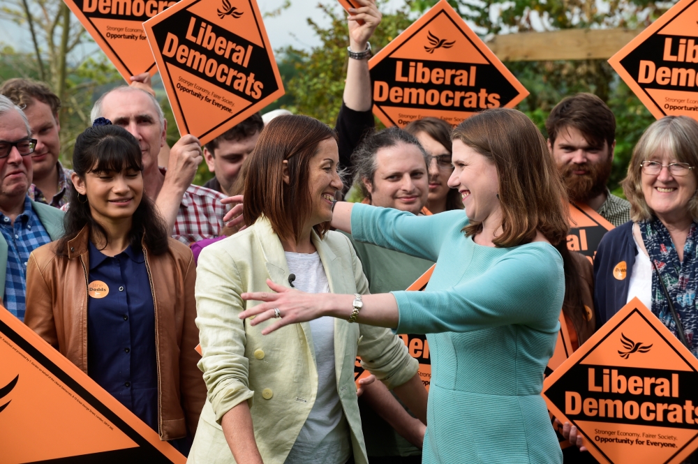 Jane Dodds celebrates winning the Brecon and Radnorshire by-election with Liberal Democrat leader Jo Swinson in Brecon, Britain, on Friday. — Reuters