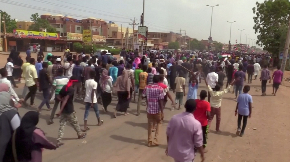 People demonstrate against the killing of protesting children, who were shot dead when security forces broke up a student protest in Khartoum, Sudan, on Friday. — Reuters