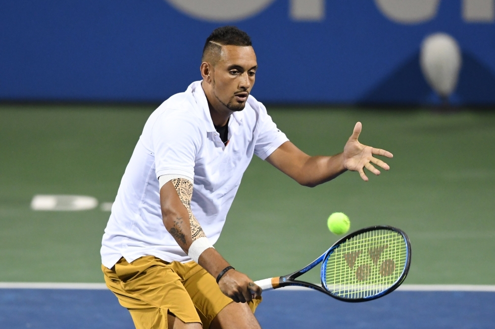 Nick Kyrgios of Australia returns a shot from Yoshihito Nishioka of Japan during Day 4 of the Citi Open at Rock Creek Tennis Center in Washington, DC, on Thursday. — AFP