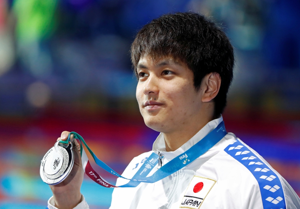 In this file photo taken on July 30, 2017, Junya Koga of Japan poses with the silver medal at World Aquatics Championships in Budapest, Hungary. — Reuters