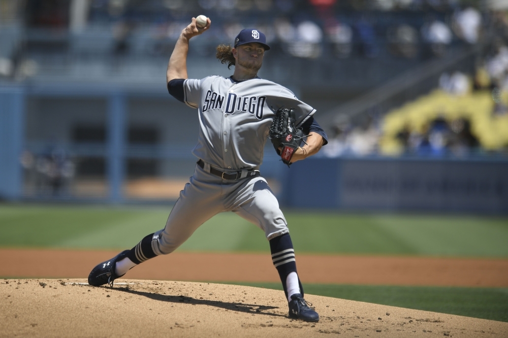 Chris Paddack of the San Diego Padres pitches against the Los Angeles Dodgers in the first inning at Dodger Stadium in Los Angeles, California, on Sunday. — AFP