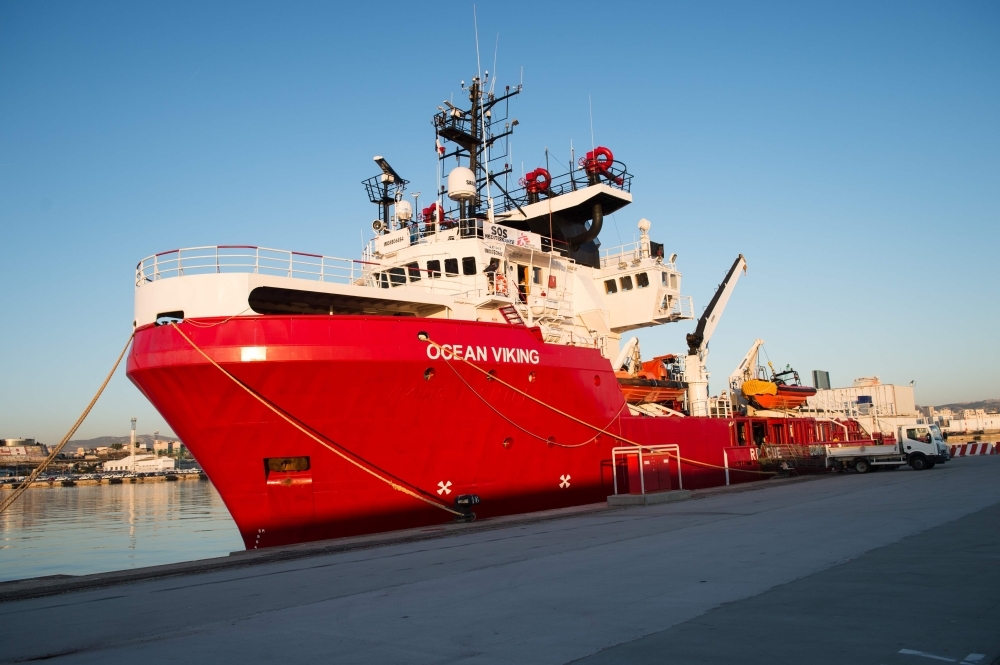 A picture taken on Sunday in Marseille harbor shows the French NGOs SOS Mediterranee and Medecins sans Frontieres (MSF) new boat Ocean Viking moored before the departure for a migrants search and rescue mission off Libya.  — AFP