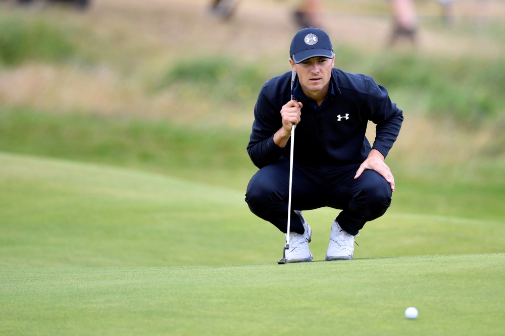 In this file photo taken on Jul 21, 2019, Spieth lines up a putt on the second hole during the final round of The Open Championship golf tournament at Royal Portrush Golf Club, Dunluce Course, Portrush. — Reuters