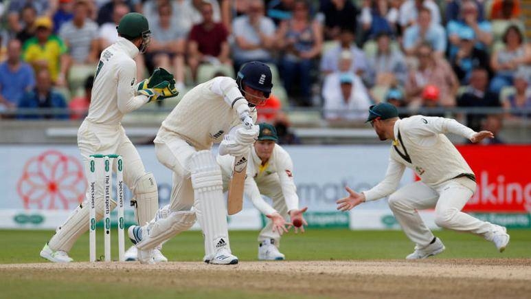 England's Stuart Broad is caught out by Australia's Steve Smith off the bowling of Nathan Lyon during the first Ashes Test at Edgbaston, Birmingham, Britain, on Monday. — Reuters