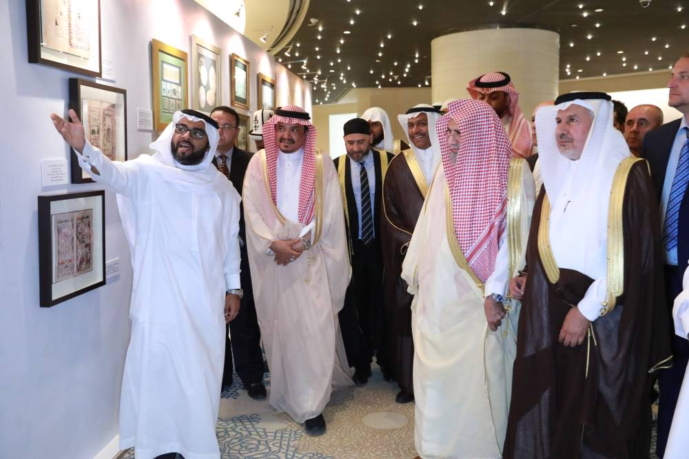 Minister of Haj and Umrah Dr. Mohammed Saleh Bentin and other guests tour an exhibition on the sidelines of the 44th annual Haj Grand Symposium in Makkah, Monday. — SPA
