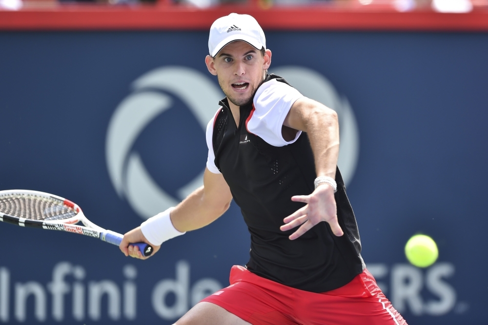  Dominic Thiem of Austria watches the ball against Marin Cilic of Croatia during day 7 of the Rogers Cup at IGA Stadium in Montreal on Thursday. -AFP