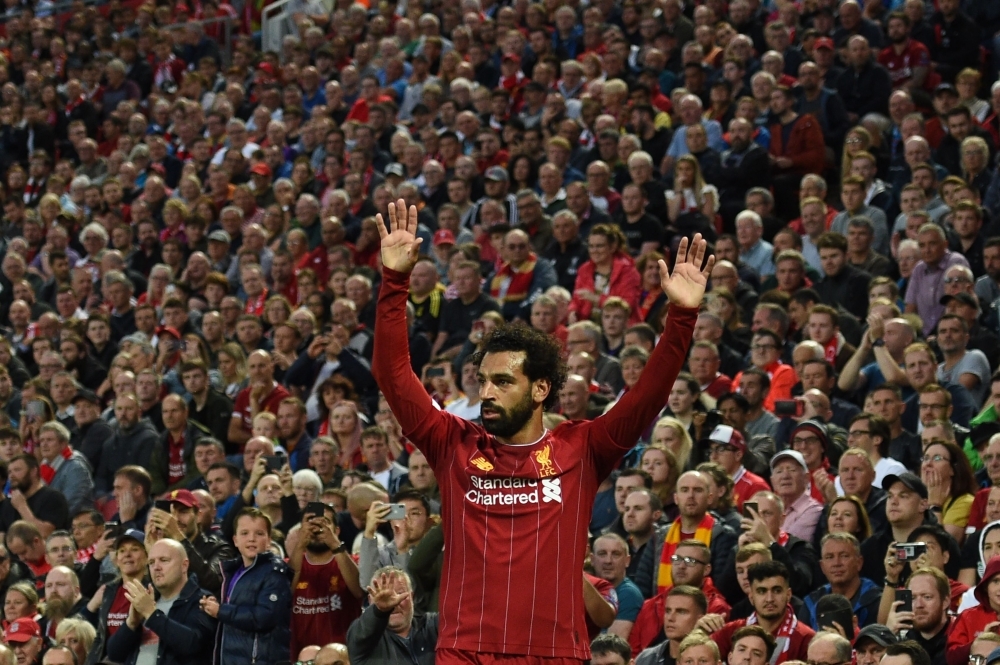 Liverpool's Egyptian midfielder Mohamed Salah gestures during the English Premier League football match between Liverpool and Norwich City at Anfield in Liverpool, north west England, on Friday. — AFP