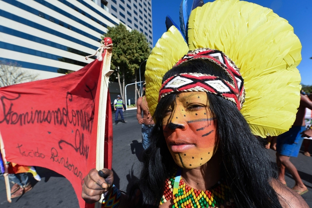 Brazilian indigenous women march in Brasilia, on Tuesday. -AFP