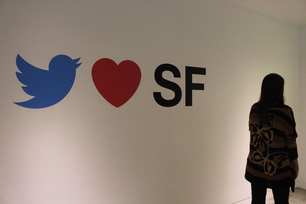 Graphics on a wall inside Twitter's San Francisco headquarters expresses love for its home city on Wednesday.  -AFP