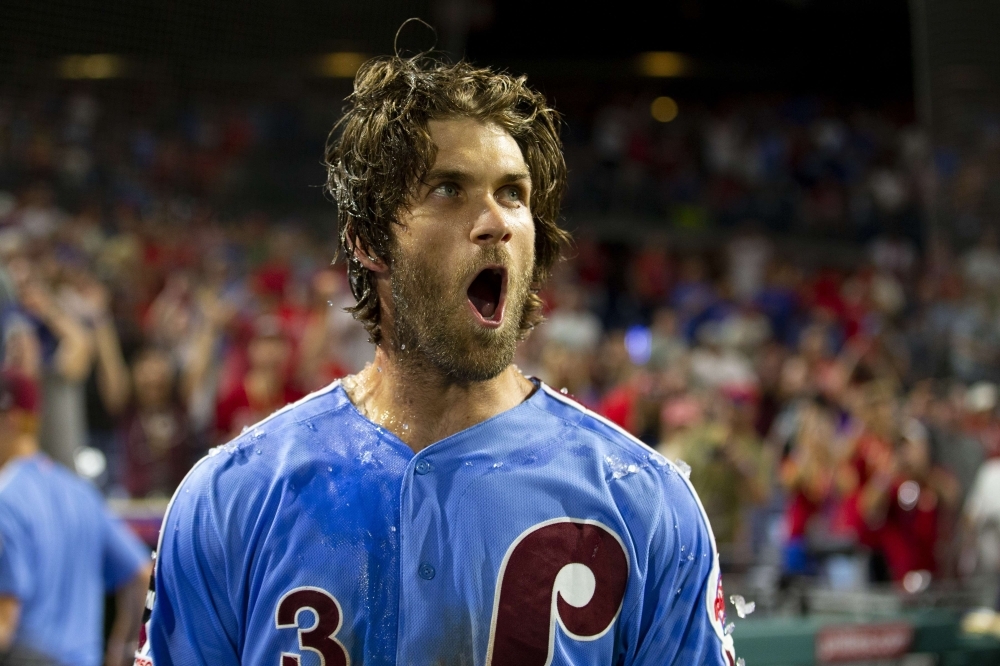 Bryce Harper #3 of the Philadelphia Phillies reacts after hitting a walk-off grand slam against the Chicago Cubs at Citizens Bank Park in Philadelphia, Pennsylvania, on Thursday. — AFP