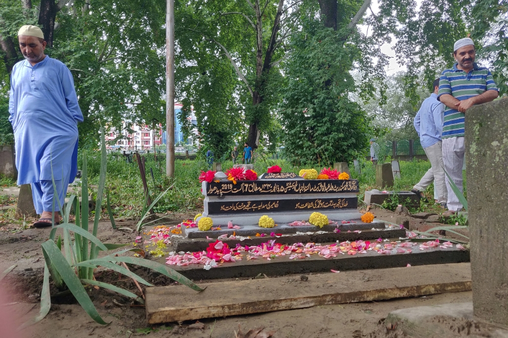 People leave after offering prayers at the grave of Mohammad Sikander Bhat, during restrictions after Indian government scrapped the special constitutional status for Kashmir, in Srinagar, in this Aug. 10, 2019 file photo. — Reuters