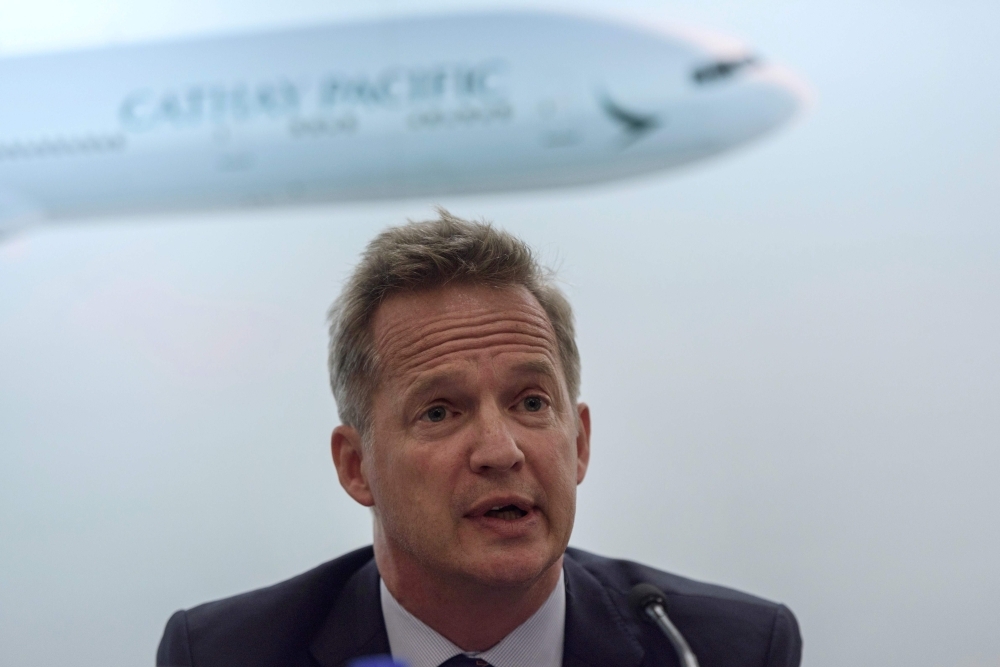 Cathay Pacific's chief executive officer Rupert Hogg speaks during a press conference on the company's half-year results in Hong Kong in this Aug. 16, 2017 file photo. — AFP