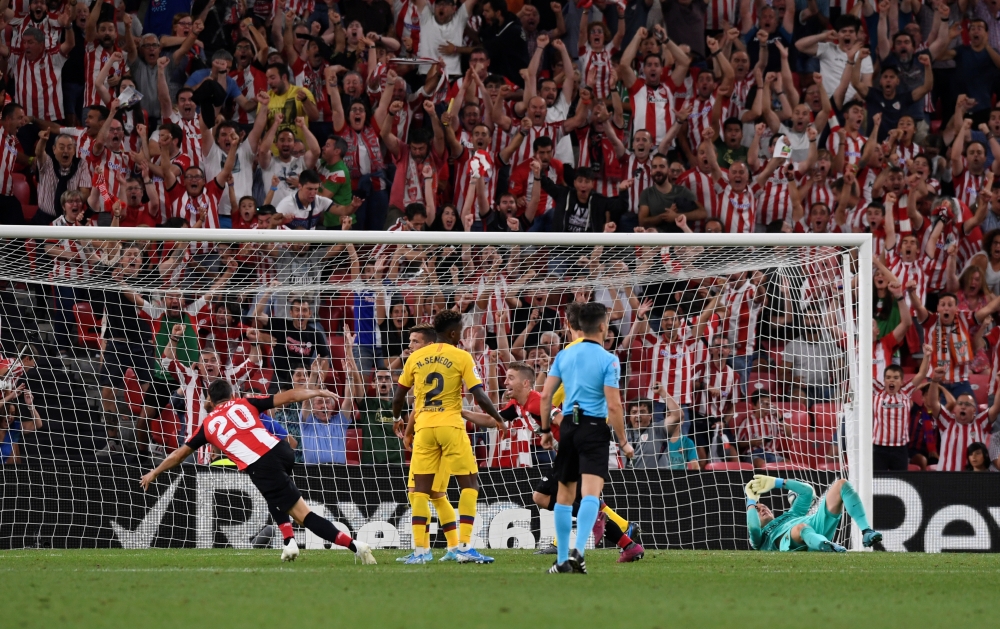 Athletic Bilbao's Aritz Aduriz celebrates scores their first goal against FC Barcelona at San Mames, Bilbao, Spain, on Friday. — Reuters