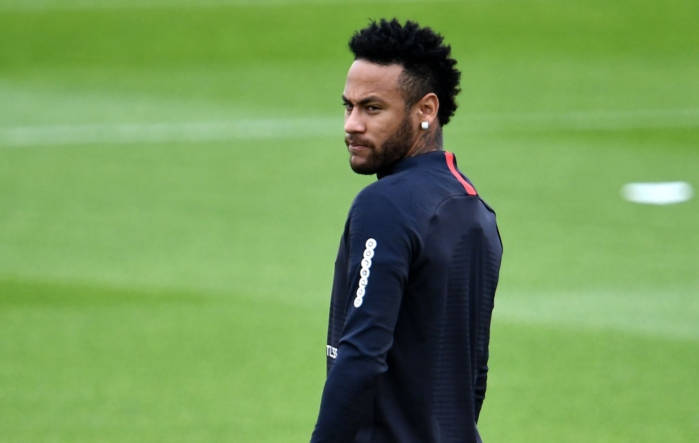 Paris Saint-Germain's Brazilian forward Neymar looks on as he takes part in a training session in Saint-Germain-en-Laye, west of Paris on the eve of the French L1 football match between Paris Saint-Germain (PSG) and Rennes, on Saturday. — AFP