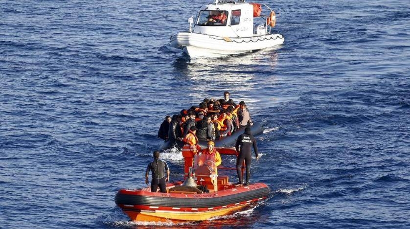 
A Turkish Coast Guard fast rigid-hulled inflatable boat tows a dinghy filled with refugees and migrants in the Turkish territorial waters of the North Aegean Sea. -Reuters file photo
