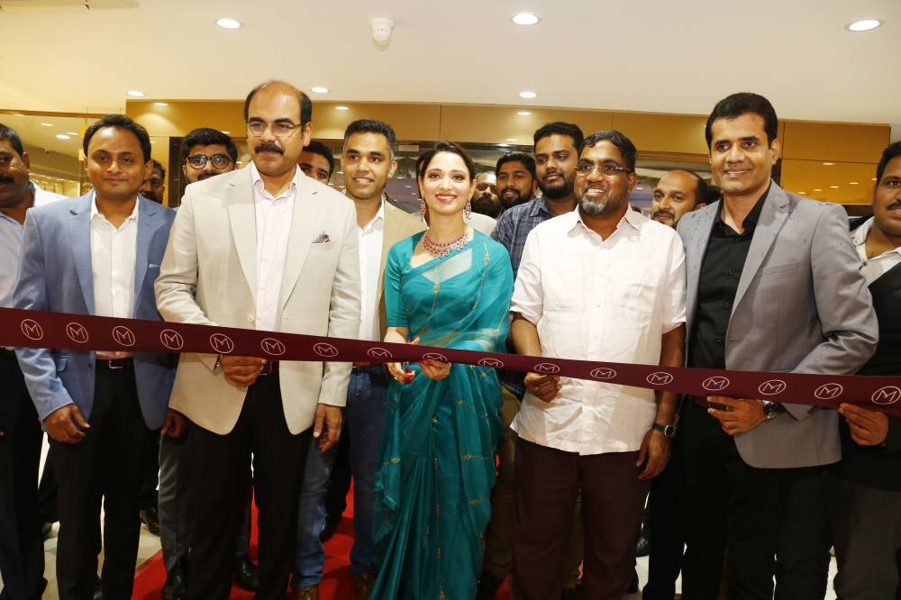 Indian film actress Tamannaah Bhatia inaugurates the 26th showroom of Malabar Gold & Diamonds in Karnataka, India at Bannerghatta Road, Bengaluru last Aug. 16  in the presence of  Chairman  MP Ahammed, Managing Director - India Operations Asher O                                     management team members of the group, along with the customers, media & well-wishers.