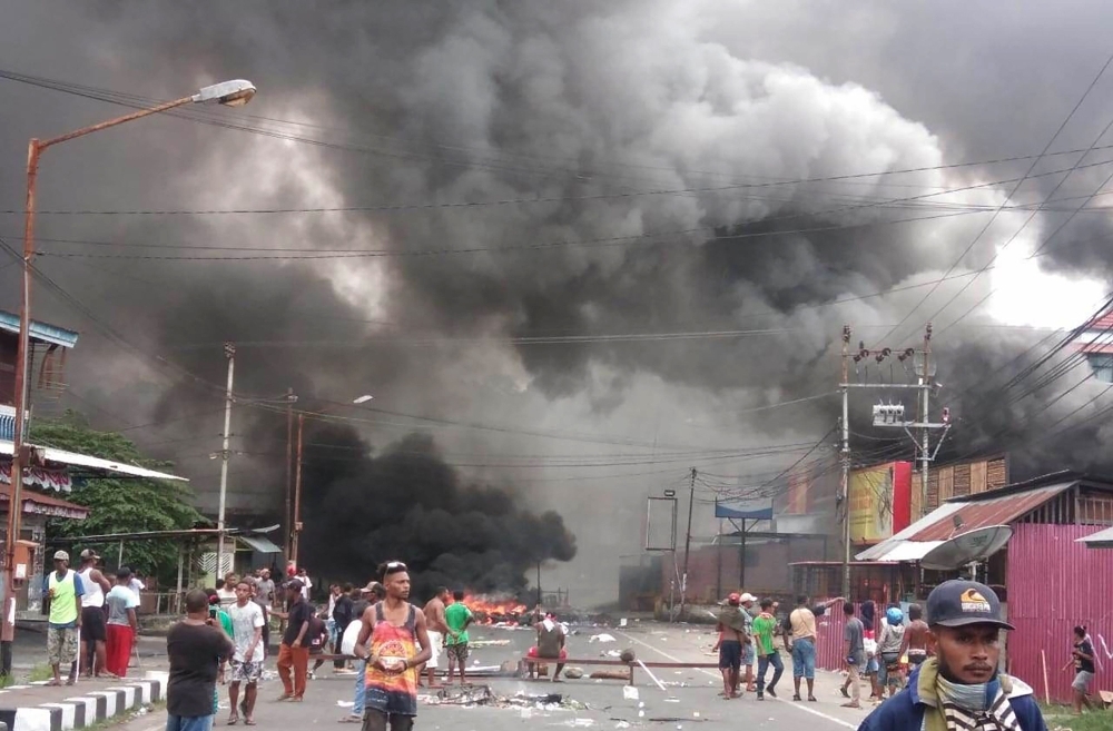 Protesters take to the street to face off with Indonesian police in Manokwari, Papua on Monday. -AFP