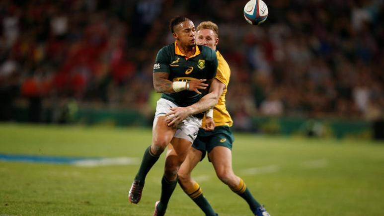 In this file photo taken on Sept. 30, 2017, Australia's captain Michael Hooper challenges South Africa's Elton Jantjies during Rugby Union Championship match at Toyota Stadium, Bloemfontein, South Africa. — Reuters