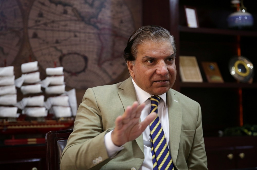 Lt. Gen. (retd) Muzammil Hussain, chairman of the Water and Power Development Authority (WAPDA), gestures during an interview at his office in Islamabad, Pakistan, on Monday. — Reuters