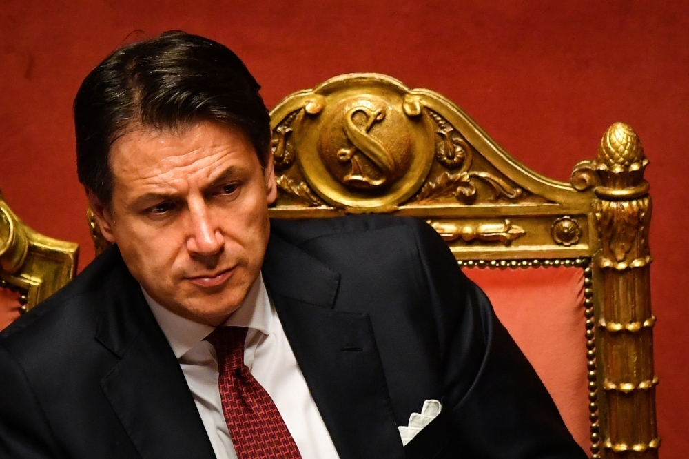 Italian Prime Minister Giuseppe Conte reacts after delivering a speech at the Italian Senate, in Rome, on Tuesday, as the country faces a political crisis. — AFP