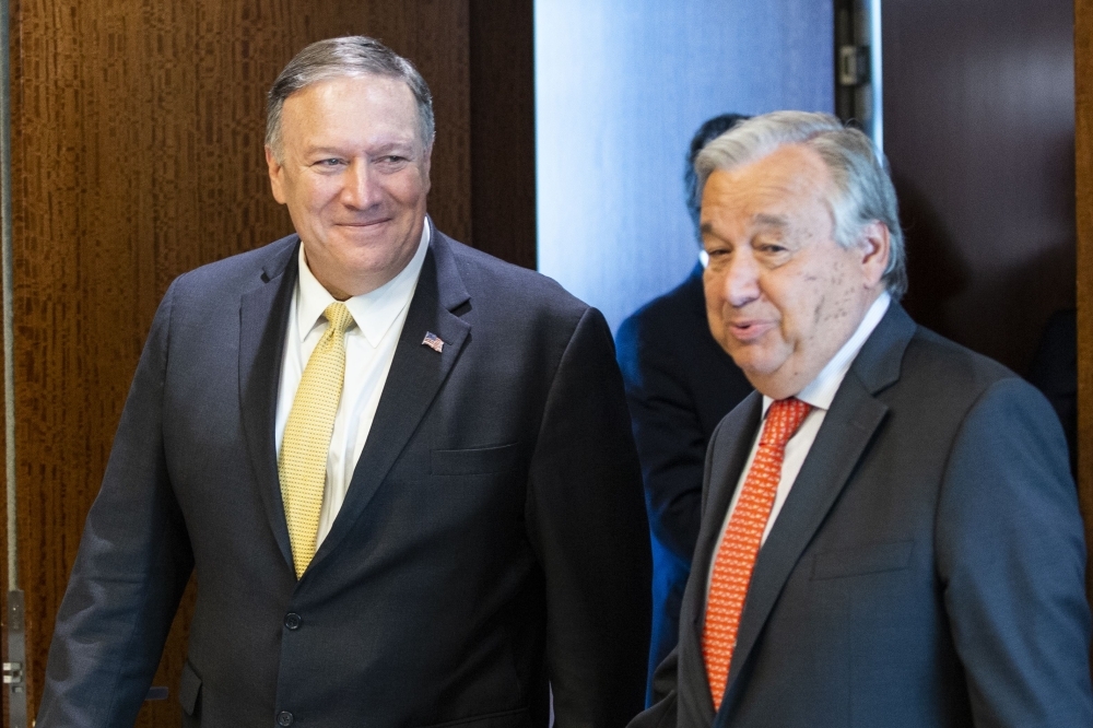 US Secretary of State Mike Pompeo, left, and UN Secretary-General Antonio Guterres arrive for a meeting at the United Nations Headquarters in New York City on Tuesday. — AFP