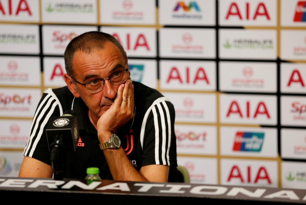 FILE PHOTO: Soccer Football - International Champions Cup - Juventus v Tottenham Hotspur - Singapore National Stadium, Singapore - July 21, 2019  Juventus coach Maurizio Sarri during the post match press conference  REUTERS/Feline Lim/File Photo