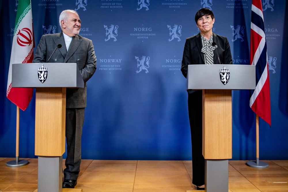 Norway's Foreign Minister Ine Eriksen Soreide and Iran's Foreign Minister Javad Zarif, left, give a joint press conference after a meeting in Oslo on Thursday. — AFP