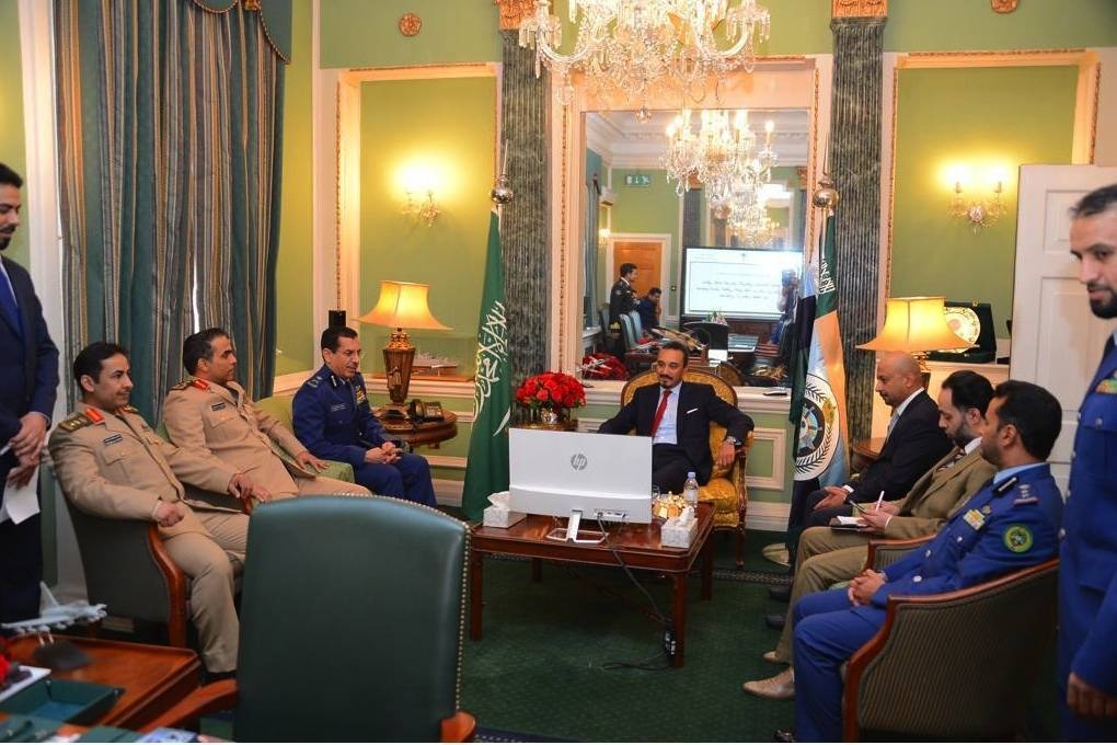 Prince Khalid Bin Bandar Bin Sultan meets with the staff of the Saudi military attache in London. — SPA