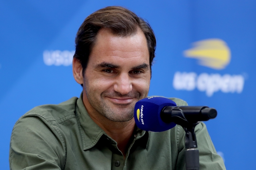 Roger Federer of Switzerland fields questions during a press conference at media day prior to the US Open at USTA Billie Jean King National Tennis Center in New York City, on Friday. — AFP
