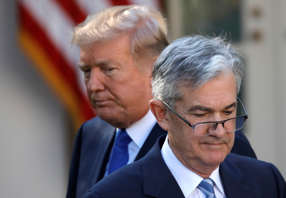  US President Donald Trump looks on as Jerome Powell, his nominee to become chairman of the U.S. Federal Reserve moves to the podium at the White House in Washington, U.S., November 2, 2017. -Reuters