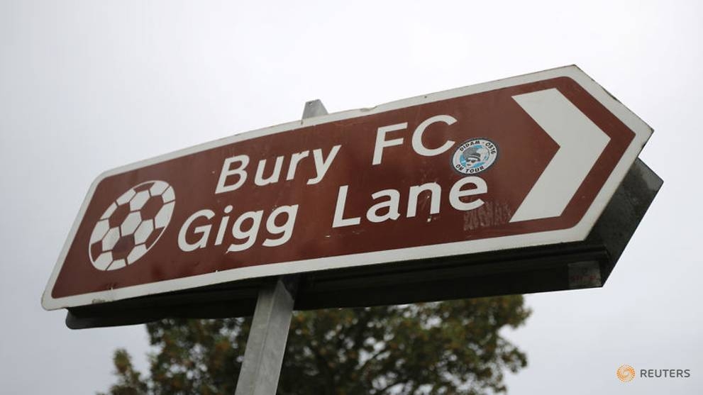 A sign outside the Bury FC stadium. — Reuters