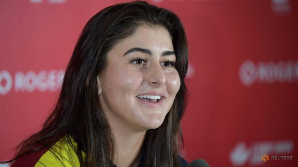 In this file photo taken on Aug 11, 2019, Bianca Andreescu (Canada) answers questions during a media conference after defeating Serena Williams (USA) in the womens final of the Rogers Cup tennis tournament at Aviva Center, Toronto, Canada. — Reuters