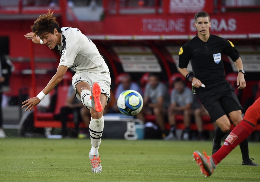 Bordeaux's Corean midfielder Hwang Ui-Jo shoots and scores during the French L1 football match between Dijon FCO and FC Girondins de Bordeaux at the Gaston Gerard stadium, central France, on Saturday. — AFP