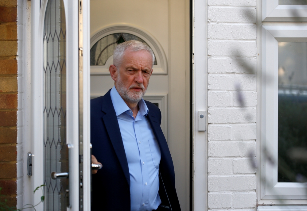 Britain's opposition Labour Party leader Jeremy Corbyn leaves his home in London on Tuesday. -Reuters