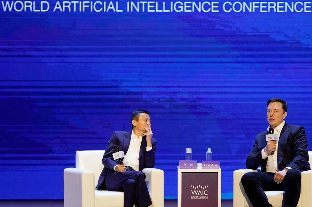 Tesla Inc CEO Elon Musk and Alibaba Group Holding Ltd Executive Chairman Jack Ma attend the World Artificial Intelligence Conference (WAIC) in Shanghai, China, on Thursday. — Reuters