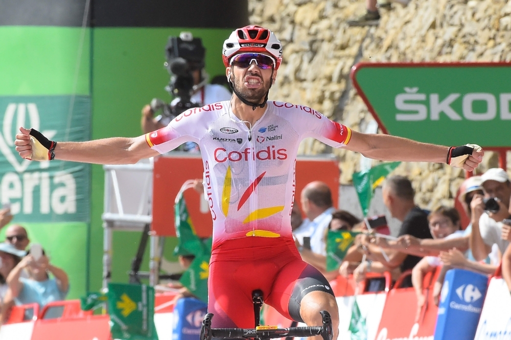 eam Cofidis rider Spain's Jesus Herrada celebrates as he crosses the finish line of the sixth stage of the 2019 La Vuelta cycling tour of Spain, a 198,9 km race from Mora de Rubielos to Ares del Maestrat, on THursday in Ares del Maestrat.  — AFP