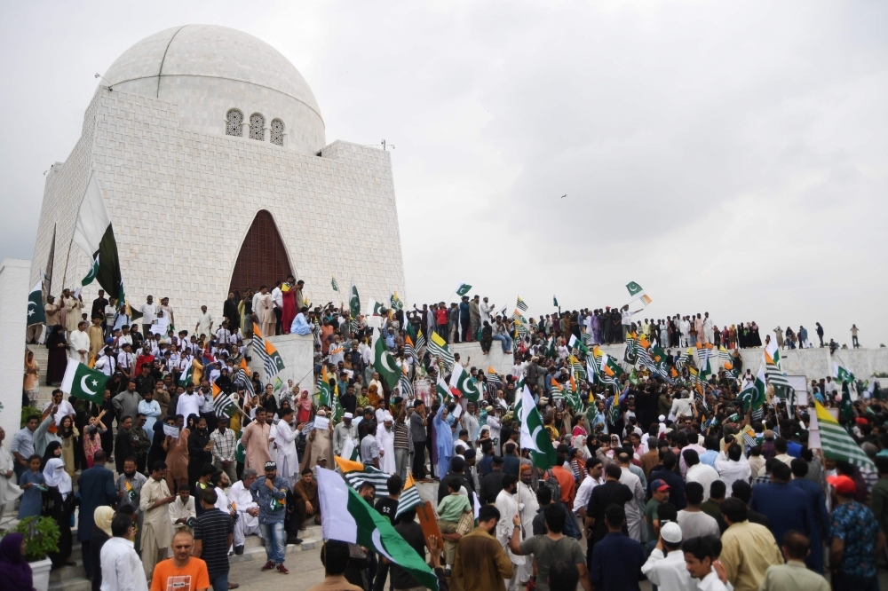 Pakistani demonstraters gather at the mausoleum of Pakistan's founding father Mohammad Ali Jinnah during an anti-India protest rally in Karachi on Friday. — AFP