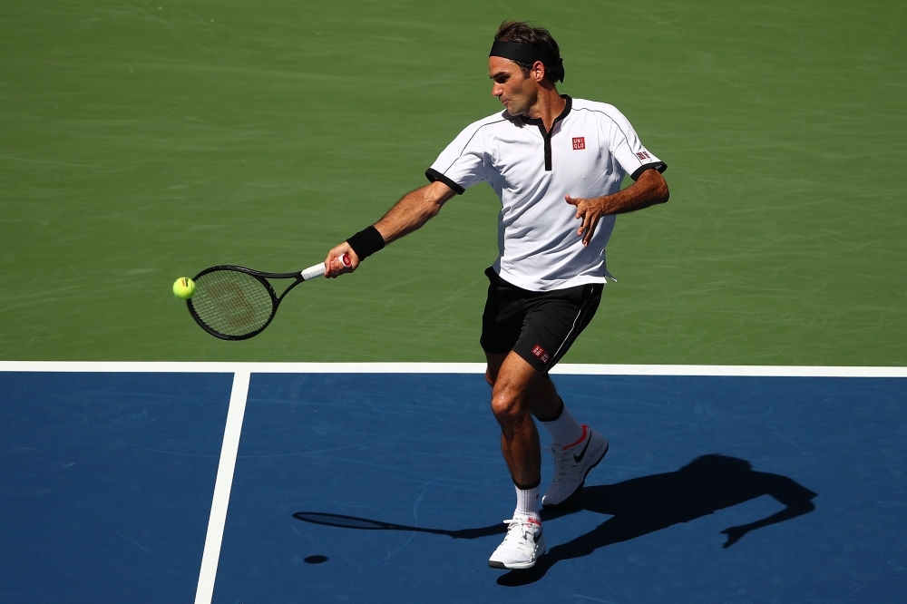 Roger Federer of Switzerland returns a shot during his Men's Singles third round match against Daniel Evans of Great Britain on day five of the 2019 US Open at the USTA Billie Jean King National Tennis Center on Friday in Queens borough of New York City. — AFP