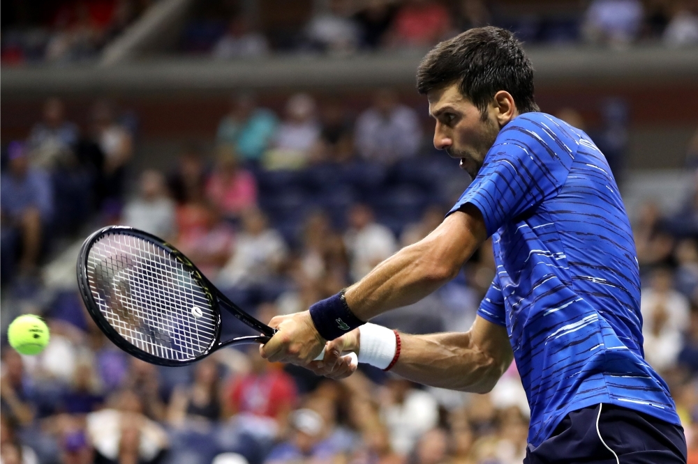 Novak Djokovic of Serbia returns a shot during his Men's Singles third round match against Denis Kudla of the United States on day five of the 2019 US Open at the USTA Billie Jean King National Tennis Center on Friday in Queens borough of New York City. — AFP