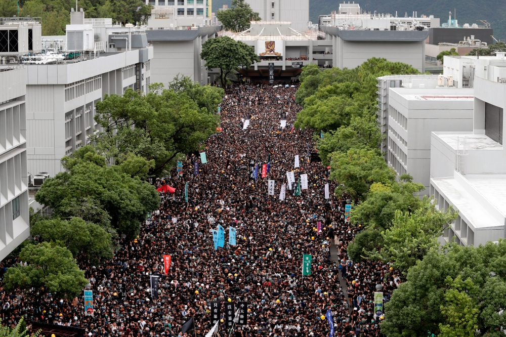 Students boycott their classes as they take part in a protest against the extradition bill at the Chinese University of Hong Kong, on Monday. -Reuters