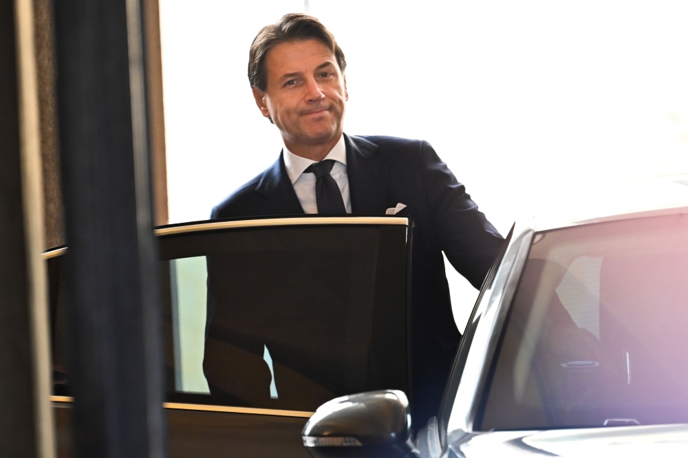 Italy’s Prime Minister Giuseppe Conte gets into his car as he leaves after attending a meeting at the Senate, after he was given by the Italian president a mandate to form a new government, in Rome, in this Aug. 29, 2019 file photo. — AFP